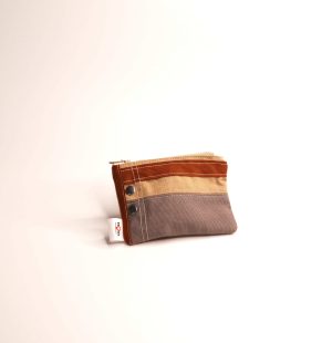 Beige coin purse with brown stripes and silver buttons